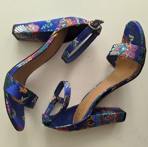 Embroidered bright blue heels